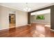 Bright dining room adjacent to kitchen with hardwood floors and lots of light at 12408 E Ohio Ave, Aurora, CO 80012