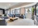 Bright and airy living room with comfortable seating and stylish decor at 13812 Honey Hush Trl, Parker, CO 80134