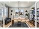Stylish office space featuring modern decor, a sleek desk, comfortable seating, and ample natural light at 13812 Honey Hush Trl, Parker, CO 80134