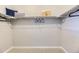 Well-organized walk-in closet with shelving and hanging space for clothing and accessories at 13812 Honey Hush Trl, Parker, CO 80134