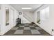 Basement with tiled floor and ample room for equipment at 4231 S Fairplay Cir # E, Aurora, CO 80014
