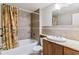 Full bathroom with shower/tub combination and stylish vanity at 4231 S Fairplay Cir # E, Aurora, CO 80014