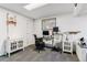 Organized office space with desk, chair, and functional storage solutions at 4231 S Fairplay Cir # E, Aurora, CO 80014