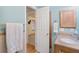 Clean bathroom with tiled shower and vanity at 4862 E Kentucky Ave # D, Denver, CO 80246