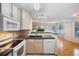 Kitchen with granite countertops and breakfast bar at 4862 E Kentucky Ave # D, Denver, CO 80246