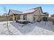 House exterior and snowy backyard view at 5232 Truckee St, Denver, CO 80249