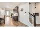 View of entry hall with staircase and dark wood cabinets at 5232 Truckee St, Denver, CO 80249