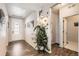 Bright entryway with tile floors and a large plant at 5232 Truckee St, Denver, CO 80249