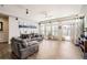 Spacious living room with gray sofas and tile floors at 5232 Truckee St, Denver, CO 80249