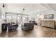 Bright and airy living room with tile floors and plenty of natural light at 5232 Truckee St, Denver, CO 80249