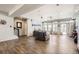 Open concept living room and kitchen with tile floors at 5232 Truckee St, Denver, CO 80249