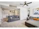 Spacious finished basement featuring carpeted floors, sofa, and unique decor at 3491 Kassler Pl, Westminster, CO 80031