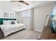 Bright bedroom features an Emerald headboard, neutral walls, and a ceiling fan at 3491 Kassler Pl, Westminster, CO 80031