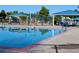 Community pool area with water features, shade structures, and ample space for relaxation at 3491 Kassler Pl, Westminster, CO 80031
