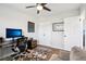 Office featuring hardwood floors, desk and storage at 3491 Kassler Pl, Westminster, CO 80031