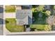 Aerial view of the house's roof, backyard, shed, and well-manicured lawn at 21851 Omaha Ave, Parker, CO 80138