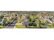 Scenic aerial view of the back of a property with a fenced yard and mature trees at 21851 Omaha Ave, Parker, CO 80138