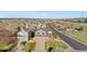 Charming two-story home with a well-manicured lawn and attached garage in a suburban neighborhood at 21851 Omaha Ave, Parker, CO 80138