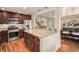 Bright kitchen with granite counters, stainless appliances, and a large center island for entertaining at 6305 Yukon St, Arvada, CO 80004
