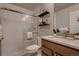 Modern bathroom with glass-enclosed shower and sleek vanity at 6309 N Hanover St, Denver, CO 80238