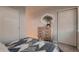Comfortable bedroom features stylish dresser and closet at 6309 N Hanover St, Denver, CO 80238