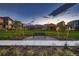The lush green of the well-maintained neighborhood park is dotted with trees and offers a scenic view at 6309 N Hanover St, Denver, CO 80238