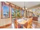 Bright breakfast nook with access to a deck and scenic view at 10730 Pinewalk Way, Highlands Ranch, CO 80130