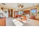 Main bedroom with ensuite bathroom access and a ceiling fan at 10730 Pinewalk Way, Highlands Ranch, CO 80130