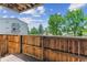 Charming balcony showcasing a private wooden deck, scenic views, and blue skies at 381 S Ames St # E104, Lakewood, CO 80226