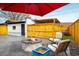 Backyard features stone pavers, seating, a fire pit, and privacy fence at 1282 S Sherman St, Denver, CO 80210