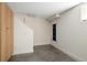 Basement with staircase, built-in storage, and painted concrete floor at 1282 S Sherman St, Denver, CO 80210