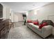 Basement features a sitting area, exercise bike, and media area with built-ins at 1282 S Sherman St, Denver, CO 80210