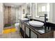 Double sink bathroom with a walk in shower at 1282 S Sherman St, Denver, CO 80210
