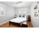 Bedroom with light gray walls and hardwood floors at 1282 S Sherman St, Denver, CO 80210