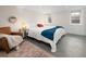 Cozy bedroom featuring neutral tones, ample natural light, and a comfortable seating area at 1282 S Sherman St, Denver, CO 80210