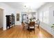 Elegant dining area featuring hardwood floors and an open view to the kitchen at 1282 S Sherman St, Denver, CO 80210
