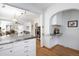 Open floor plan of kitchen leading into the living room at 1282 S Sherman St, Denver, CO 80210