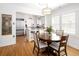Modern kitchen with stainless steel appliances and a clear view to the dining area at 1282 S Sherman St, Denver, CO 80210