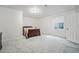 Spacious bedroom featuring neutral walls, plush carpeting, and natural light from the window at 16278 E 111Th Pl, Commerce City, CO 80022