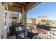 Cozy balcony with outdoor seating and a grill, offering neighborhood views at 11250 Florence St # 30B, Commerce City, CO 80640