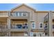 Attractive condo with a balcony featuring outdoor seating for enjoying the fresh air at 11250 Florence St # 30B, Commerce City, CO 80640
