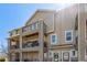 Attractive condo exterior with balconies on multiple levels and charming curb appeal at 11250 Florence St # 30B, Commerce City, CO 80640