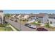 Picturesque street view showcasing well-kept homes and parked cars against a mountain backdrop at 11250 Florence St # 30B, Commerce City, CO 80640