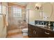 Well-lit bathroom featuring a glass enclosed shower, vanity with sink, and tile flooring at 26 Royal Ann Dr, Greenwood Village, CO 80111