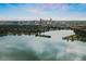 Scenic aerial view showcasing lake and downtown city skyline at 2515 Zenobia St, Denver, CO 80212
