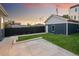 New construction home with landscaped backyard and concrete driveway at 2515 Zenobia St, Denver, CO 80212