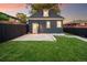 Newly constructed home featuring backyard with dark wood fence at 2515 Zenobia St, Denver, CO 80212