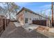 Large backyard with a patio and wood fence at 3730 Miller Ct, Wheat Ridge, CO 80033