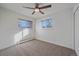 Well-lit bedroom with new carpet and large windows offering natural light at 3730 Miller Ct, Wheat Ridge, CO 80033