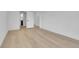 Spacious bedroom with hardwood floors and a walk-in closet at 300 S Franklin St, Denver, CO 80209